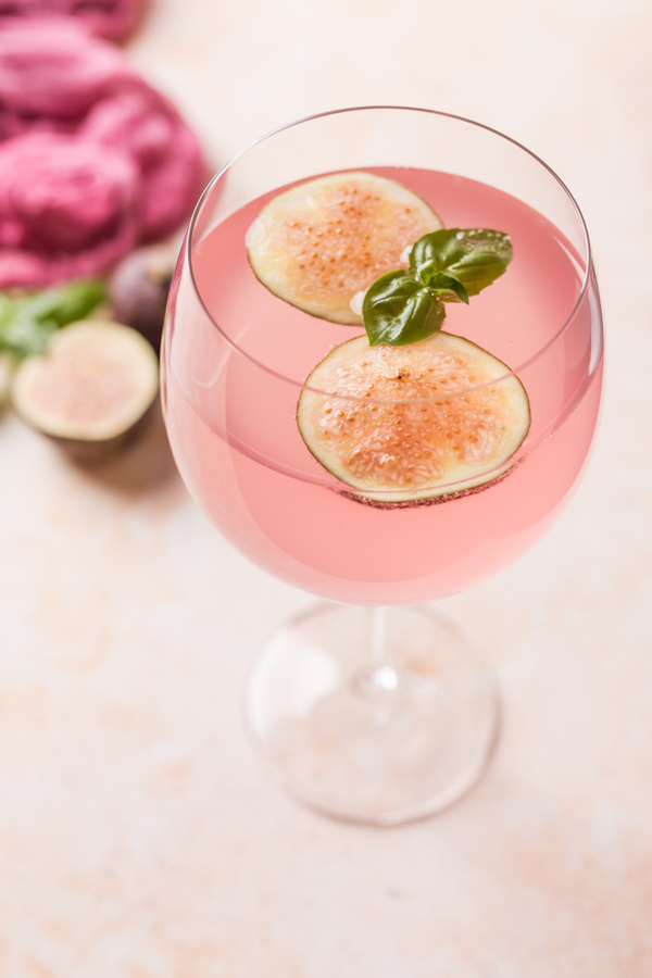 Pink cocktail with fig